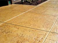 exterior floor stained with irange-crete brushes